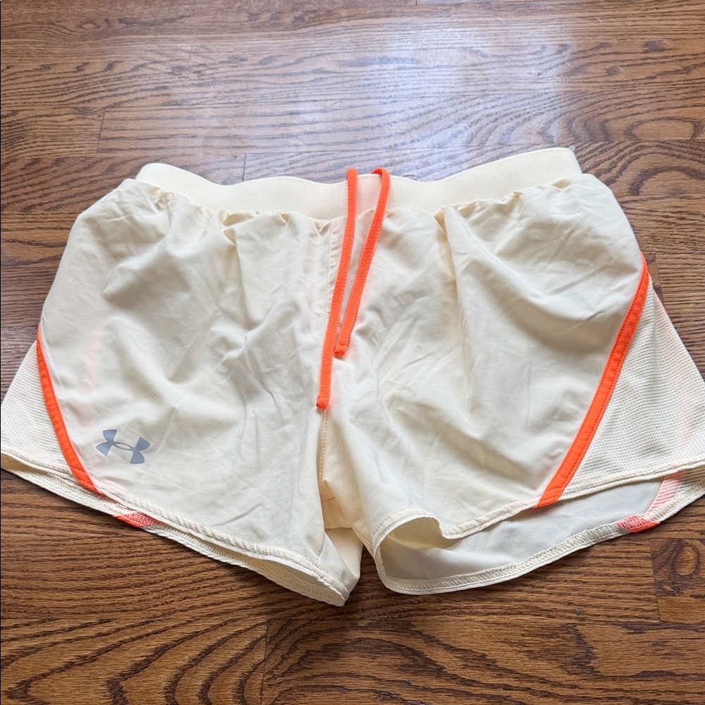 Under Armour Women's Athletic Shorts in Cream and Orange